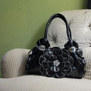 Unique Black HandBag with Floral Accent NWT
